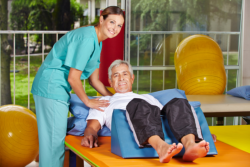 elderly man having a physical therapy