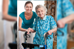 elderly woman being supported by her caregiver